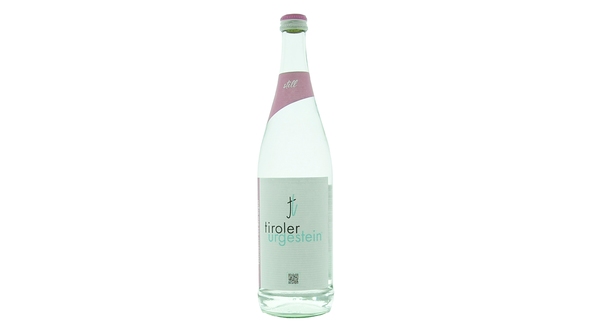 Glasflasche „tiroler urgestein still“, stilles Mineralwasser aus Tirol mit rosa Etikett und schlichtem Design.